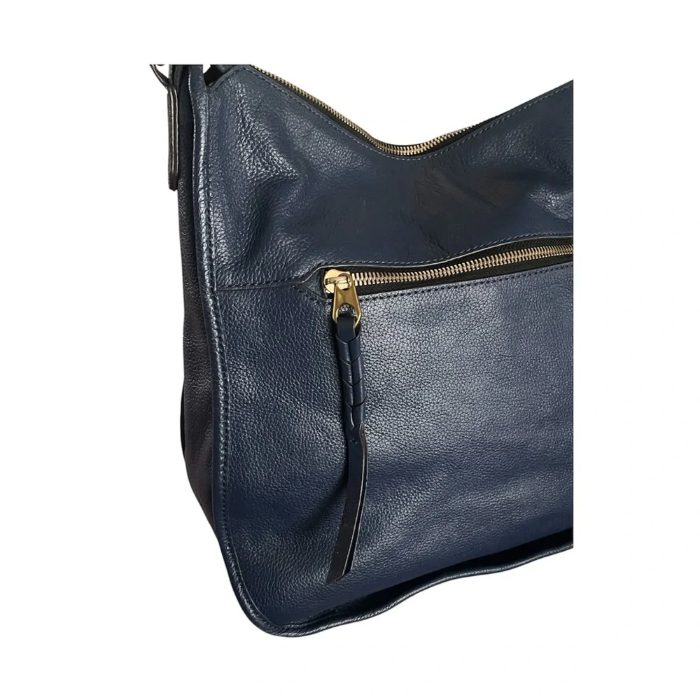orYANY Madelyn Hobo Pebbled Leather Braided Trim Handbag.